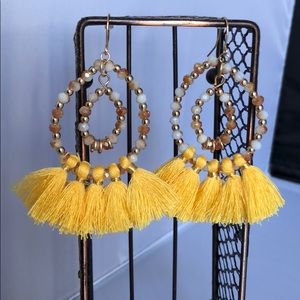 Round with yellow tassels earrings